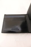 画像4: ヴィヴィアンウエストウッド 中古 / “ADVAN” 二ツ折リ財布  ネイビ  O-25-12-14-083-wa-IG-OS (4)